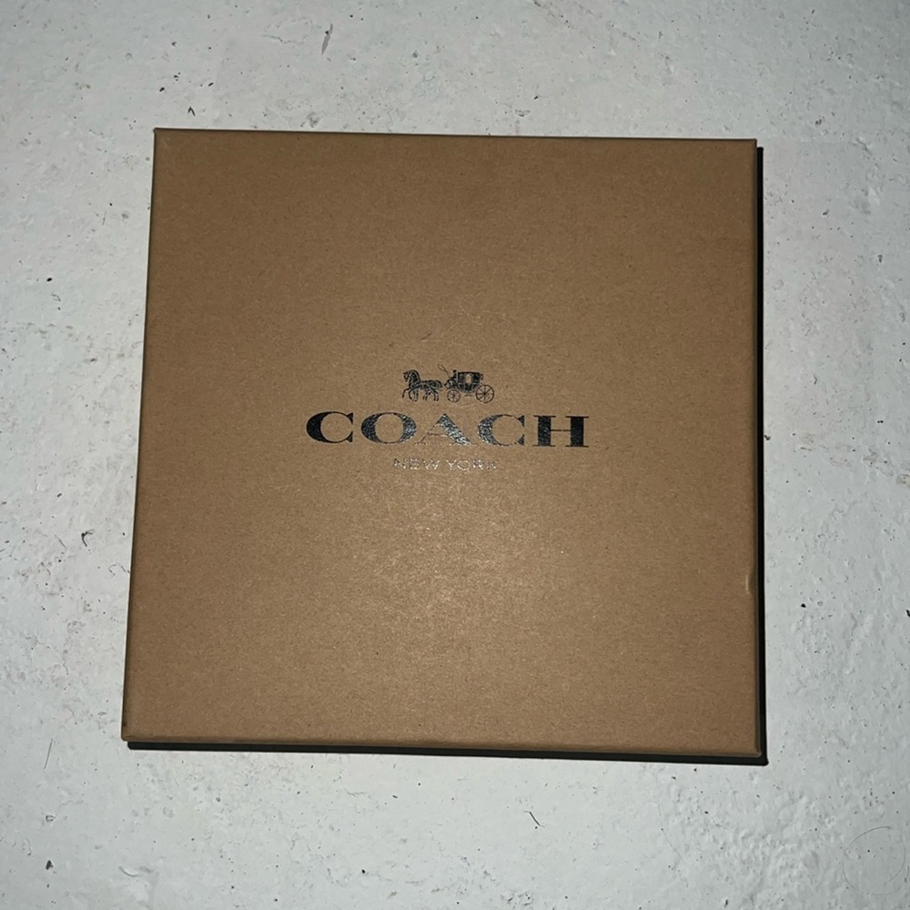 Coach Men’s boxed plaque and harness buckle cut to size 42’